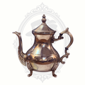 Silver teapot with intricate designs on a white background