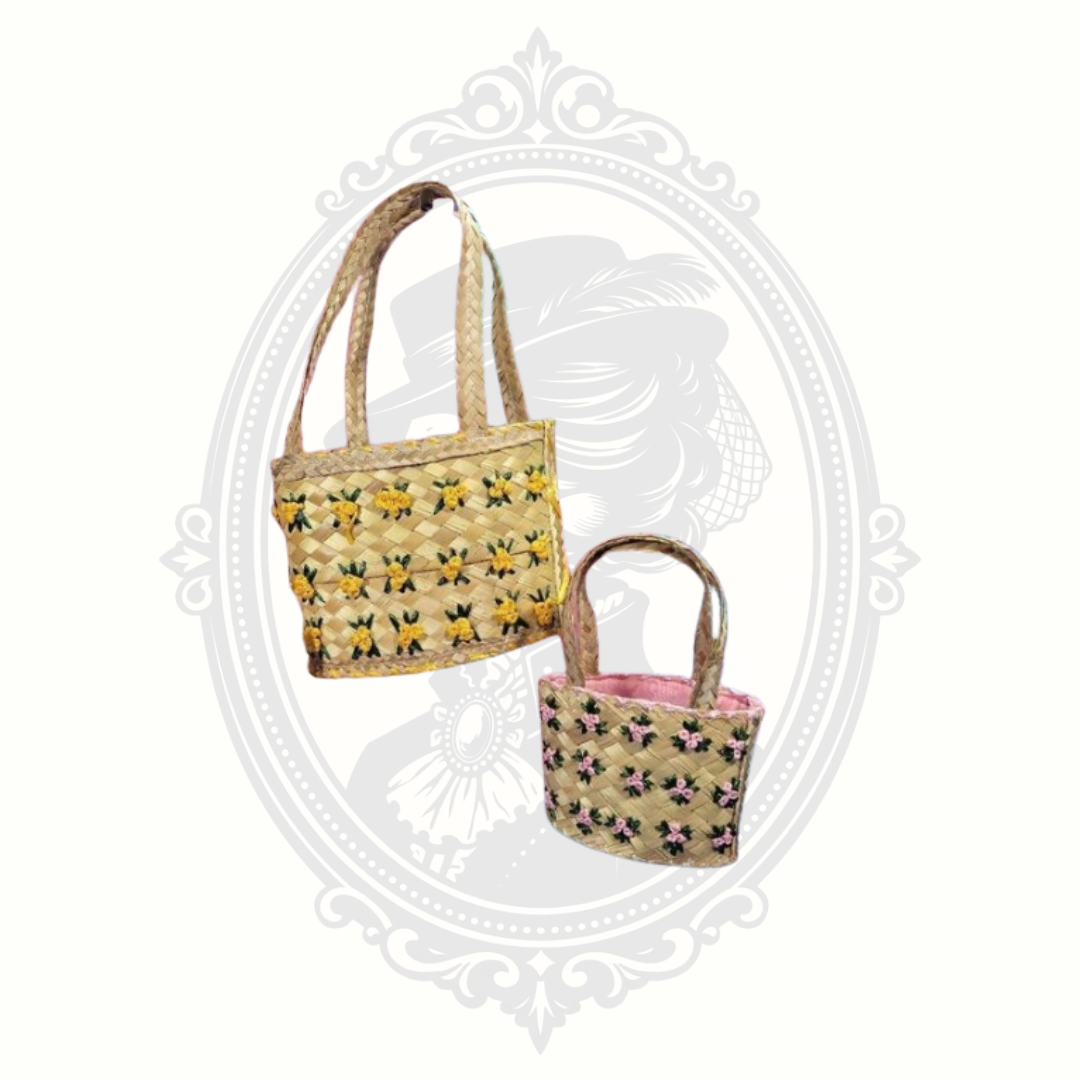 Woven basket set with embroidered yellow and pink floral details and pink fabric lining