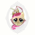 My Little Pony Fluttershy child’s plush purse in soft yellow and pink tones with character face and small carry handle.