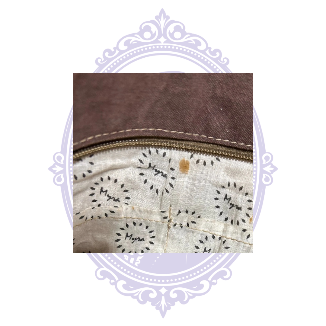 Close-up of discoloration on Myra tote interior lining