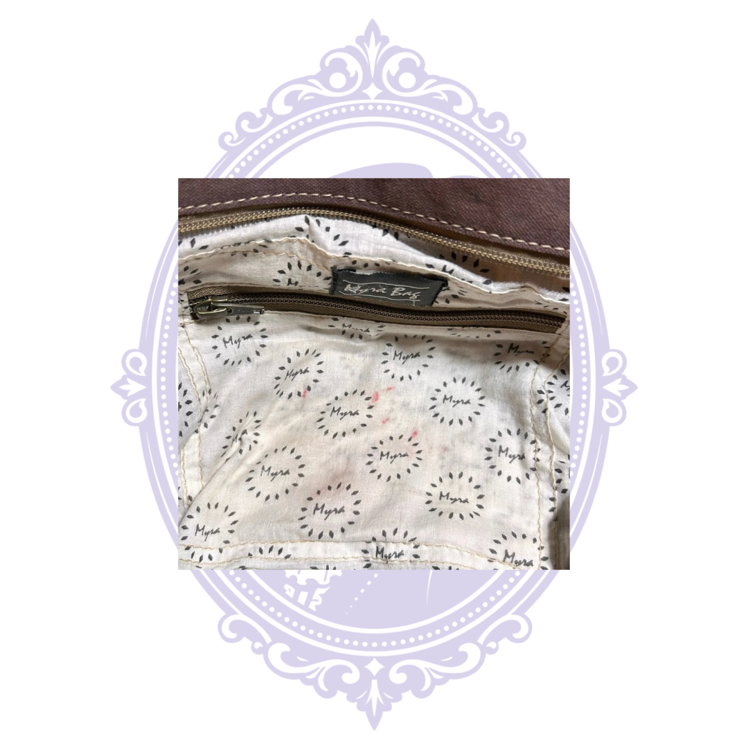 Interior zip pocket with visible pink lining marks
