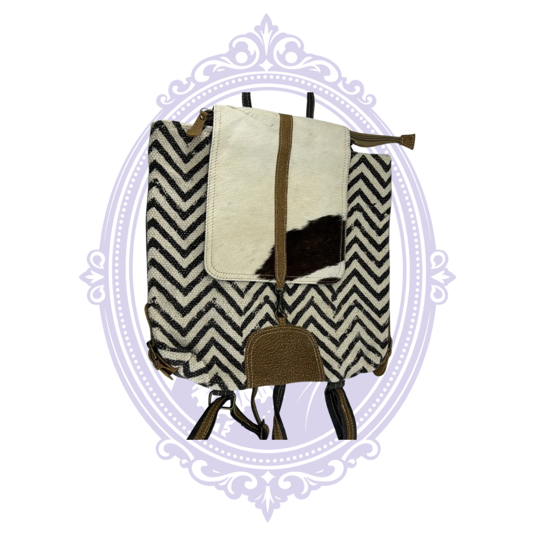 Myra Frost backpack full front view with cowhide flap and chevron pattern
