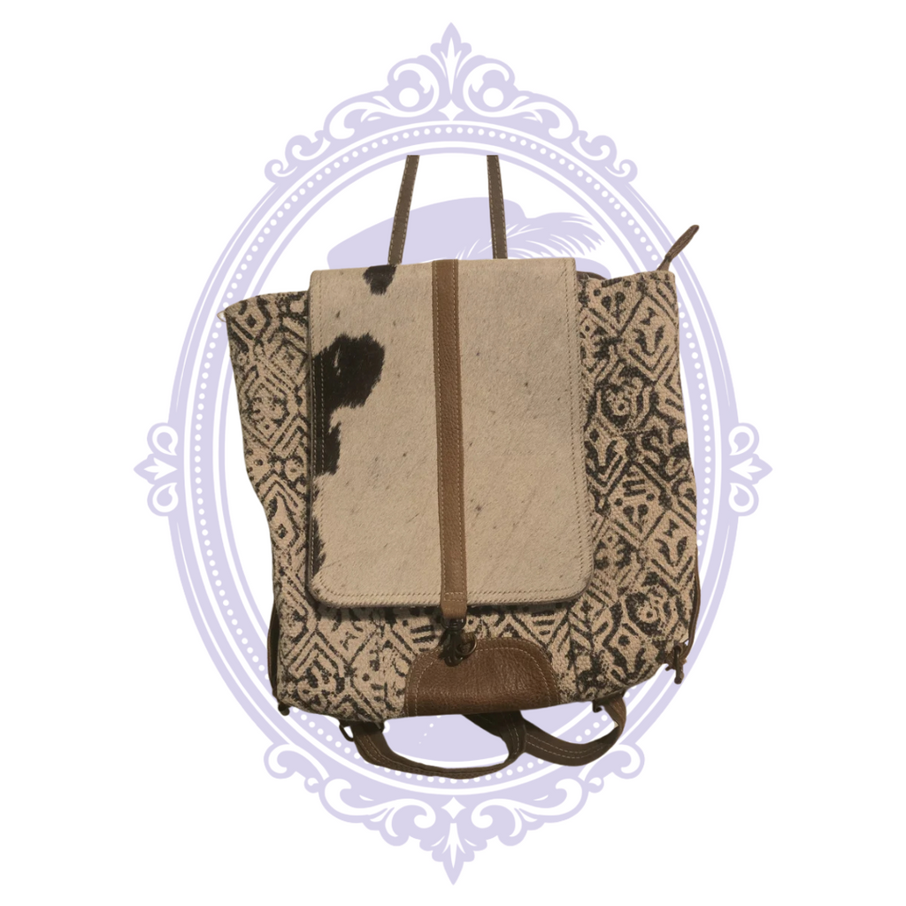 Cow Hyd Myra Bag Geometric Cowhide Flap Backpack | Mrs. Bones – Mrs. Bones ...