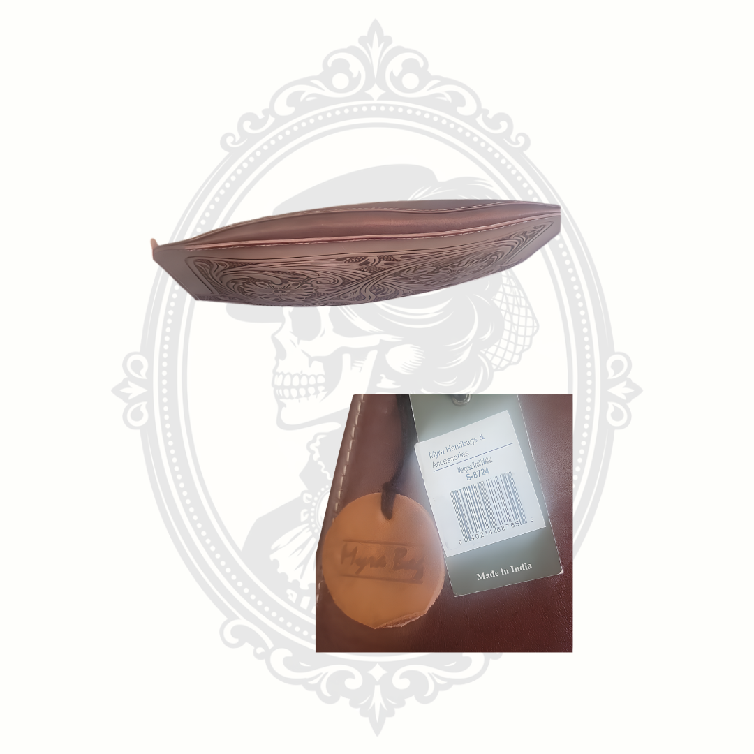 Side view of slim brown leather Myra wallet showing compact structure