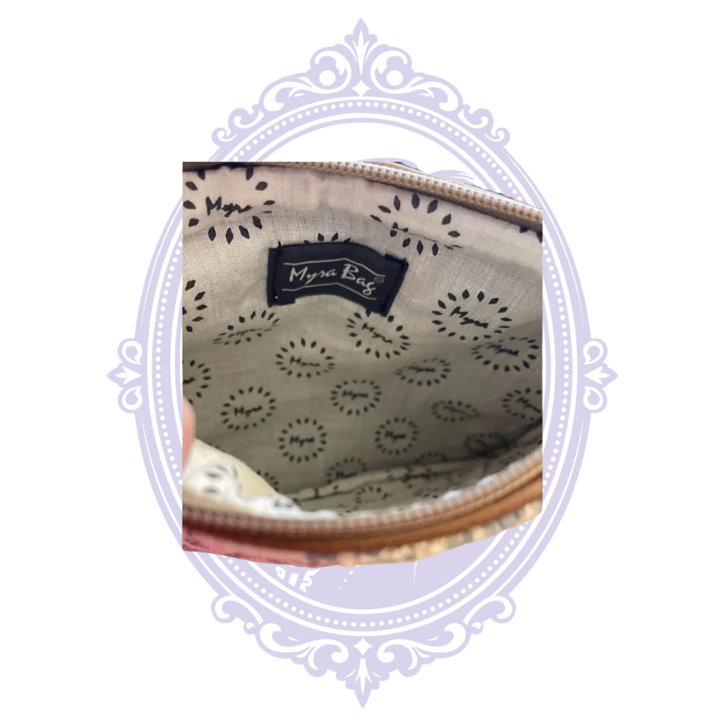 Inside of Myra Reinvention Pouch with Myra-branded patterned lining