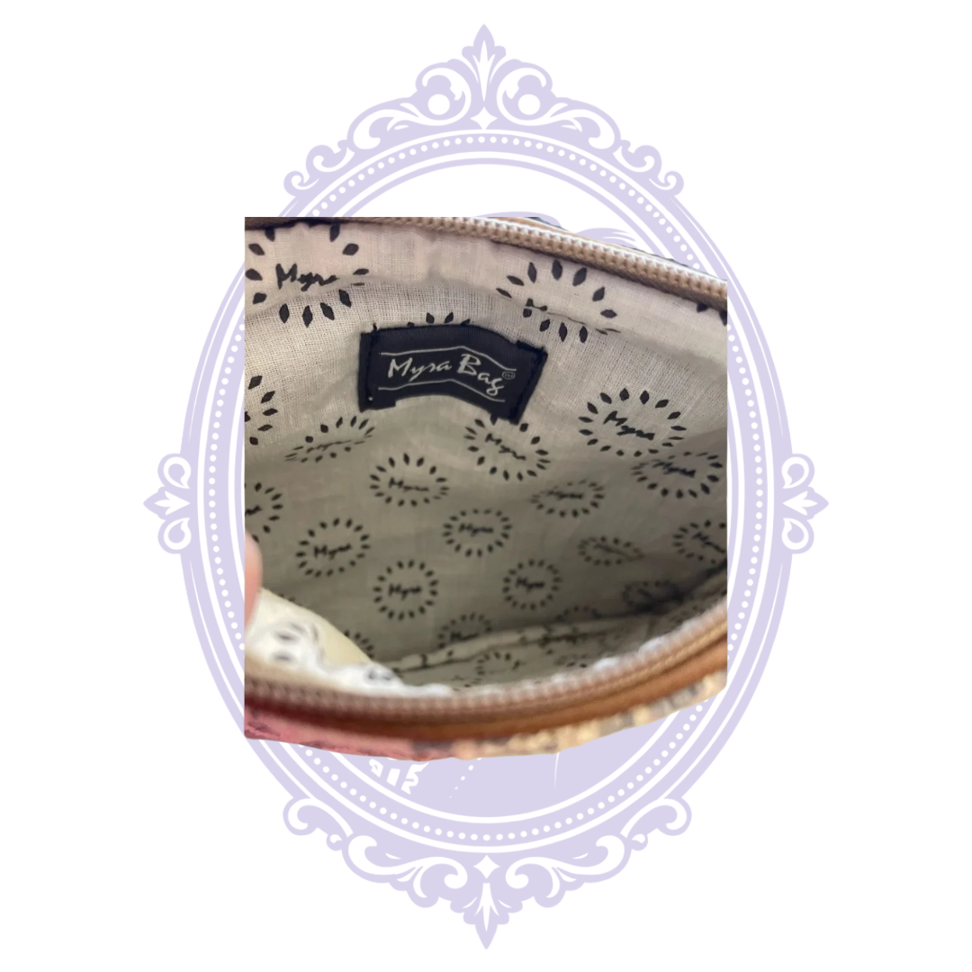 Inside of Myra Reinvention Pouch with Myra-branded patterned lining