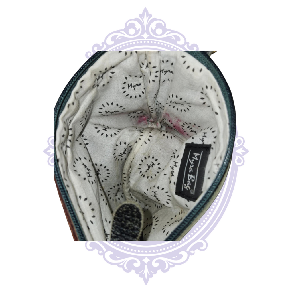 Myra-branded interior lining with visible pink stains