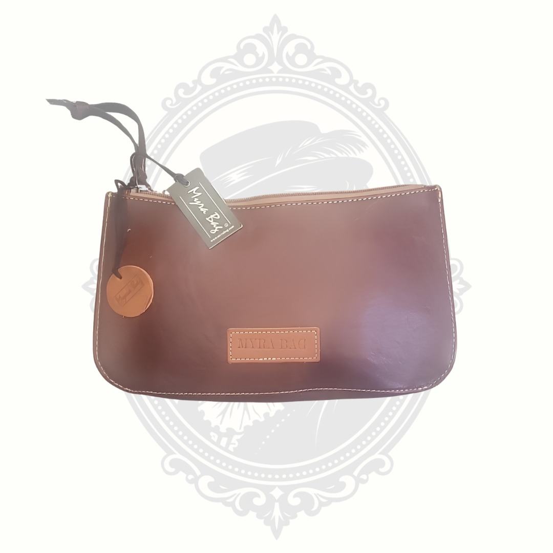 Brown Myra leather trail wallet front view with smooth finish and wrist strap