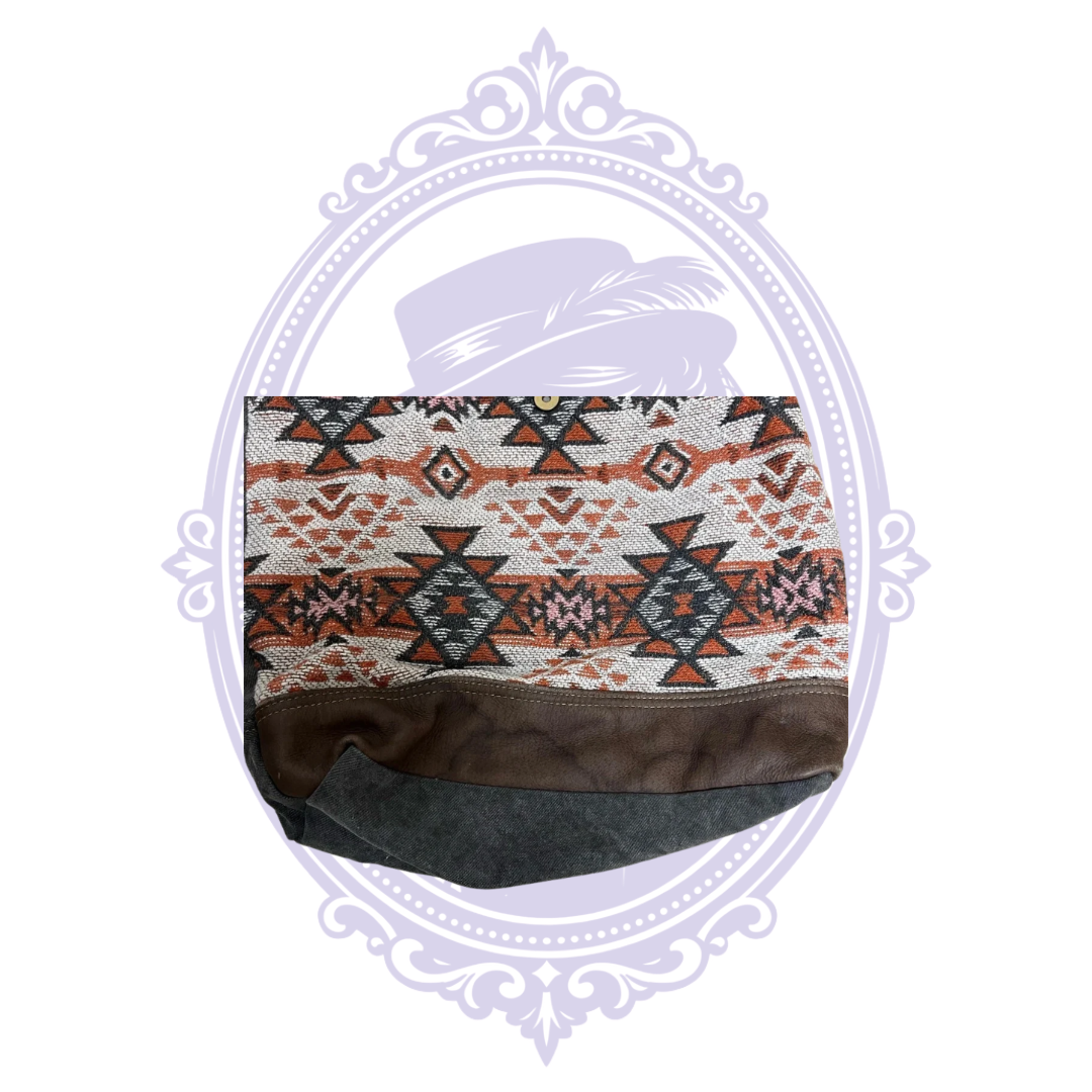 Back of Myra tribal pattern tote with gray fabric and horizontal zippered pocket.