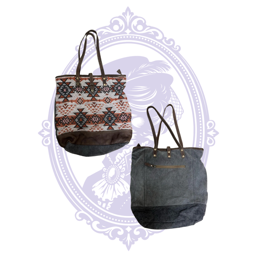 Inside Myra tribal tote showing printed lining and zippered interior pocket.