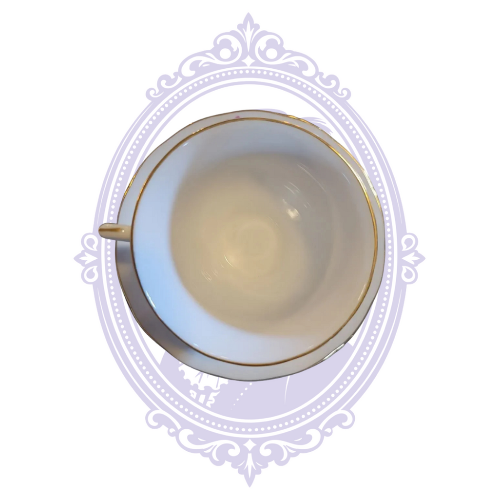 Green Nanjing Pagoda maker marks beneath porcelain teacup and saucer