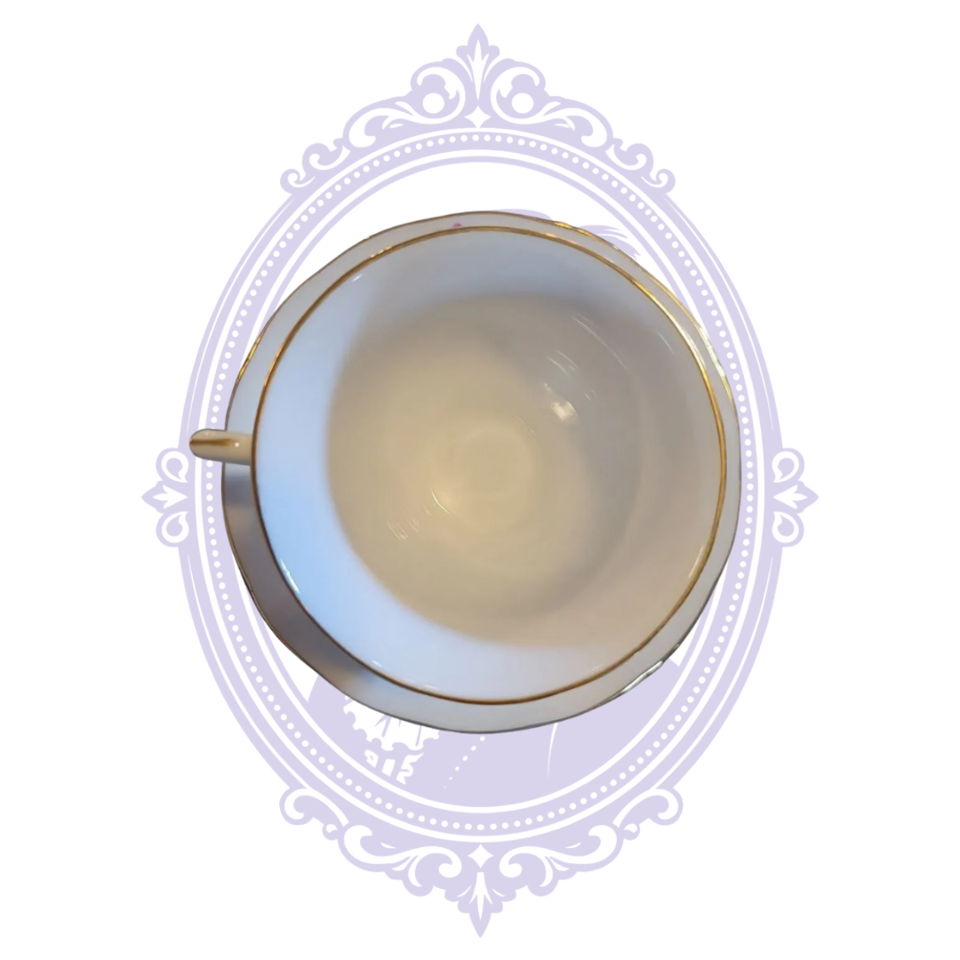 Green Nanjing Pagoda maker marks beneath porcelain teacup and saucer
