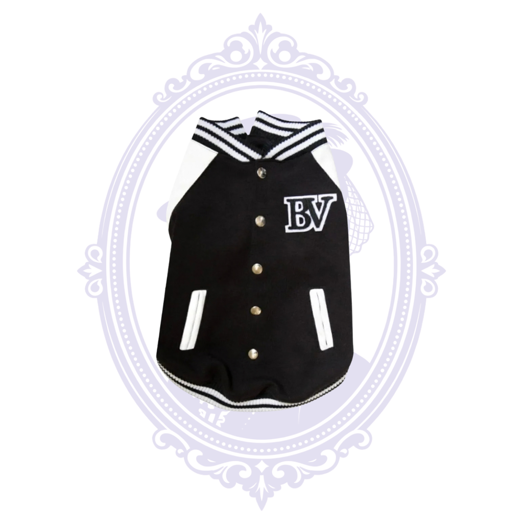 Front view of black and white Napoleon stadium dog jacket
