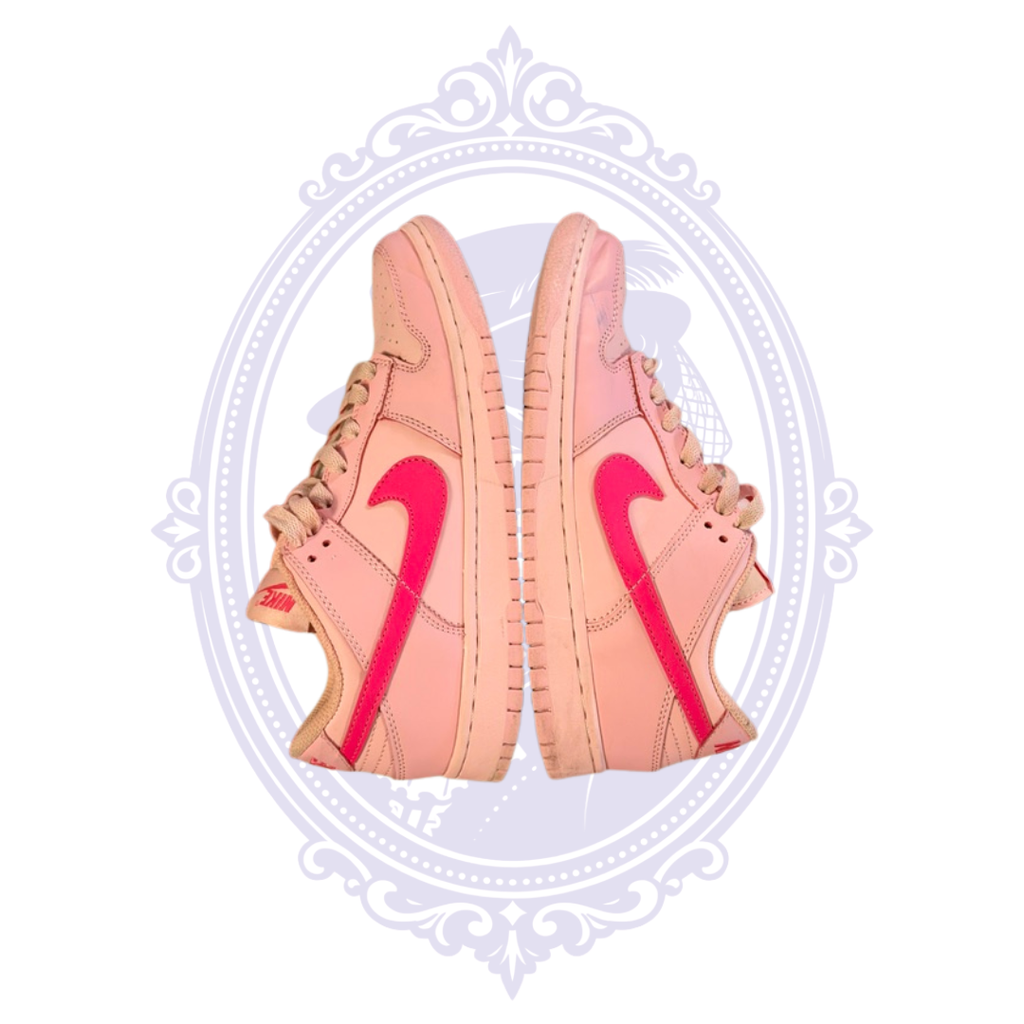Opposite side view of Nike Dunk Low Triple Pink size 7 sneakers showing pink leather construction and Nike Swooshes