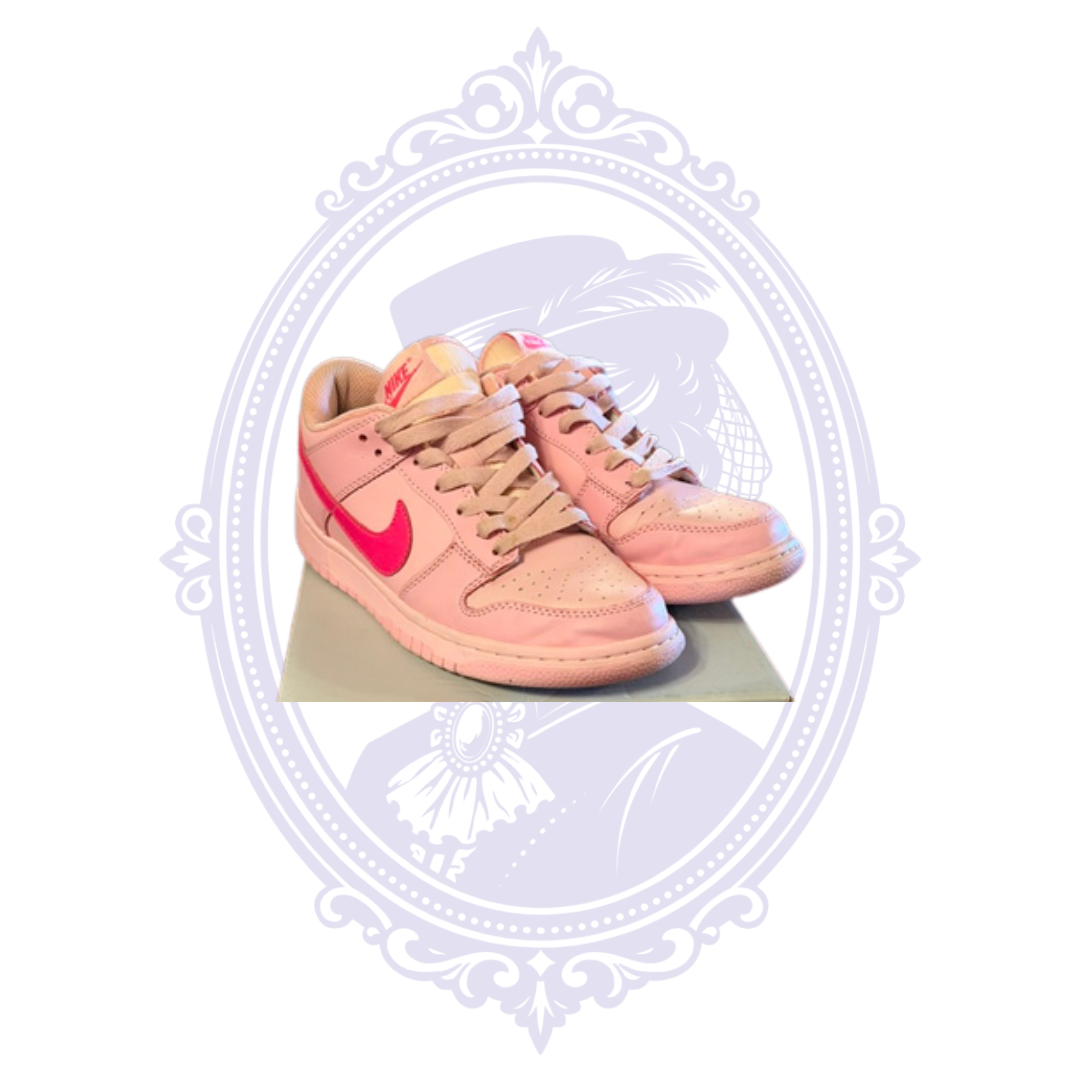 Pre-owned Nike Dunk Low Triple Pink size 7 sneakers shown together in three-quarter view with bright pink Swooshes