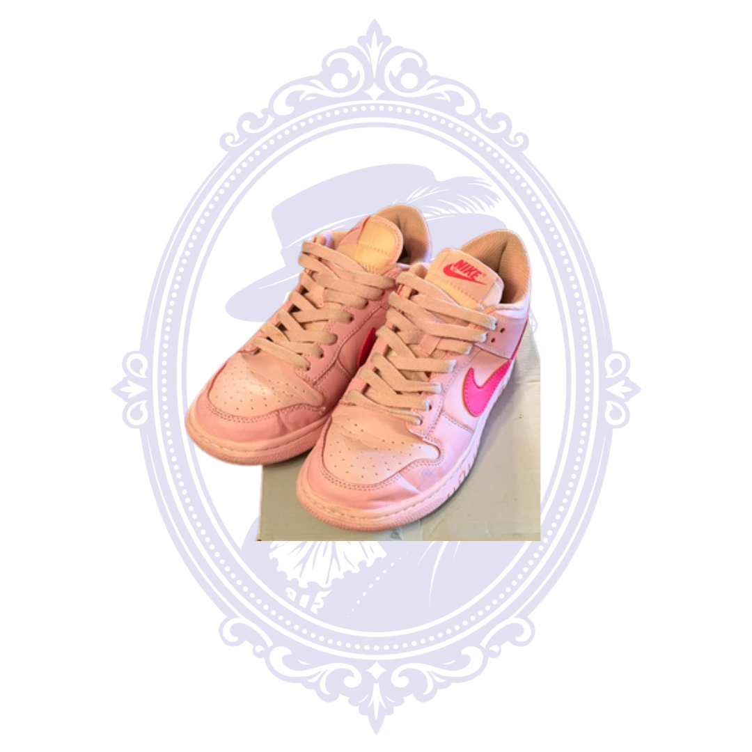Pre-owned Nike Dunk Low Triple Pink size 7 sneakers showing perforated pink toe boxes, laces and bright pink Swooshes