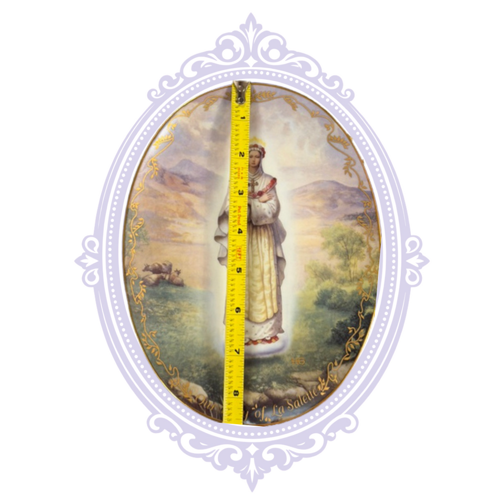Our Lady of La Salette plate measured vertically approximately eight and a half inches