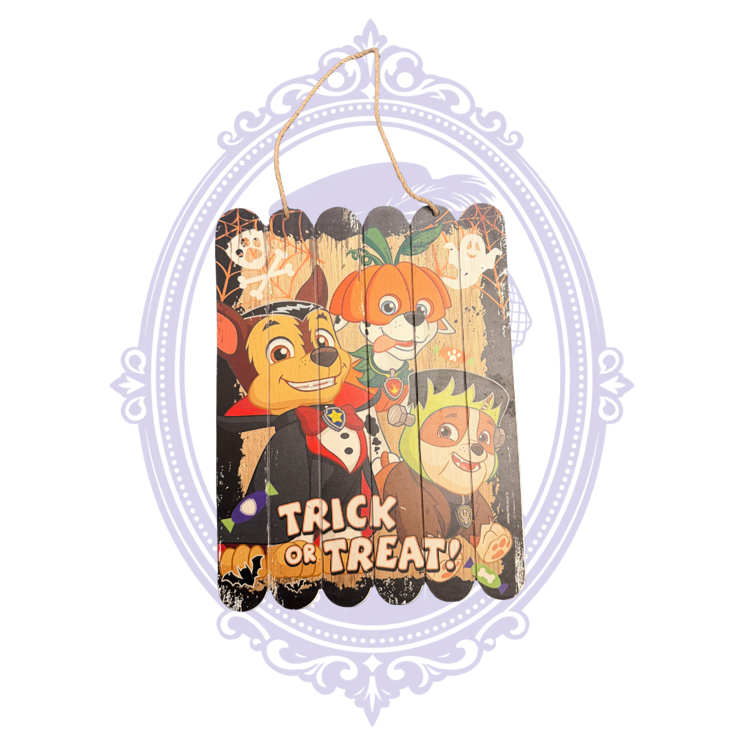 PAW Patrol Halloween hanging sign with costumed pups and Trick or Treat text
