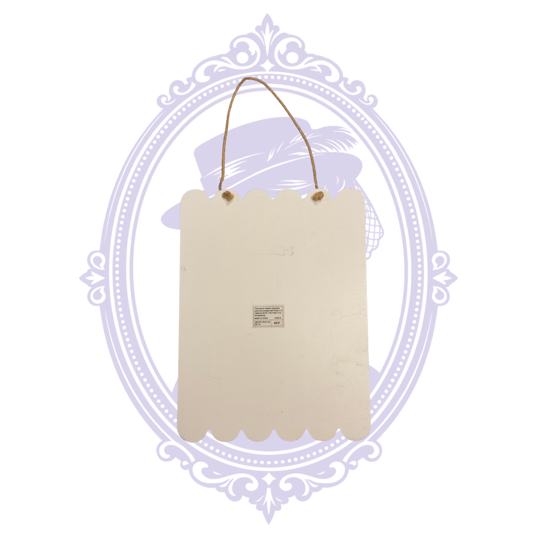 Back of 2018 PAW Patrol Halloween Trick or Treat MDF hanging sign showing cream-colored backing, scalloped edges, twine hanging cord, and manufacturer label.