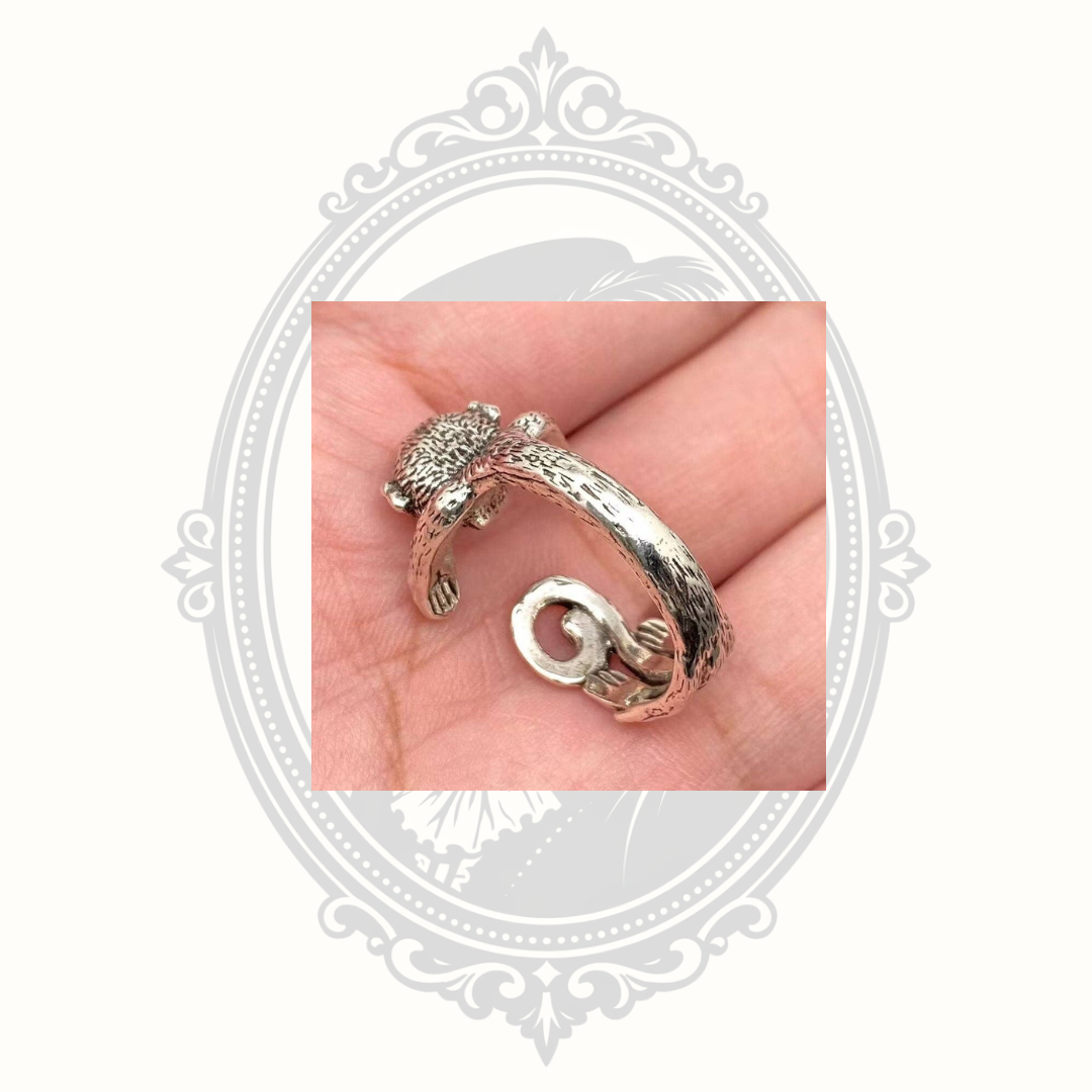 Back of silver-tone monkey wrap ring.