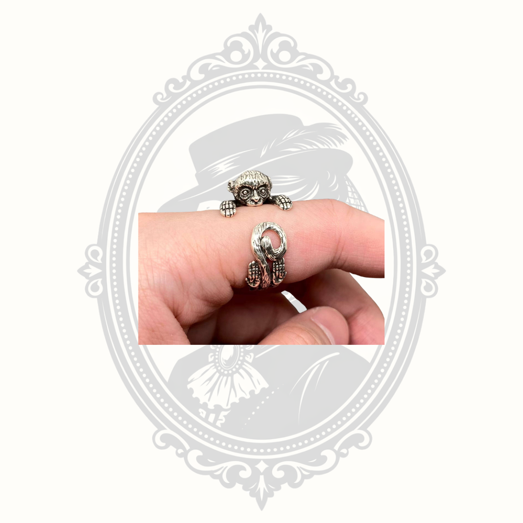 Monkey wrap ring shown worn on finger.