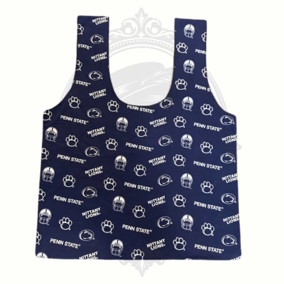 Navy blue pinafore with Penn State logo on a white background