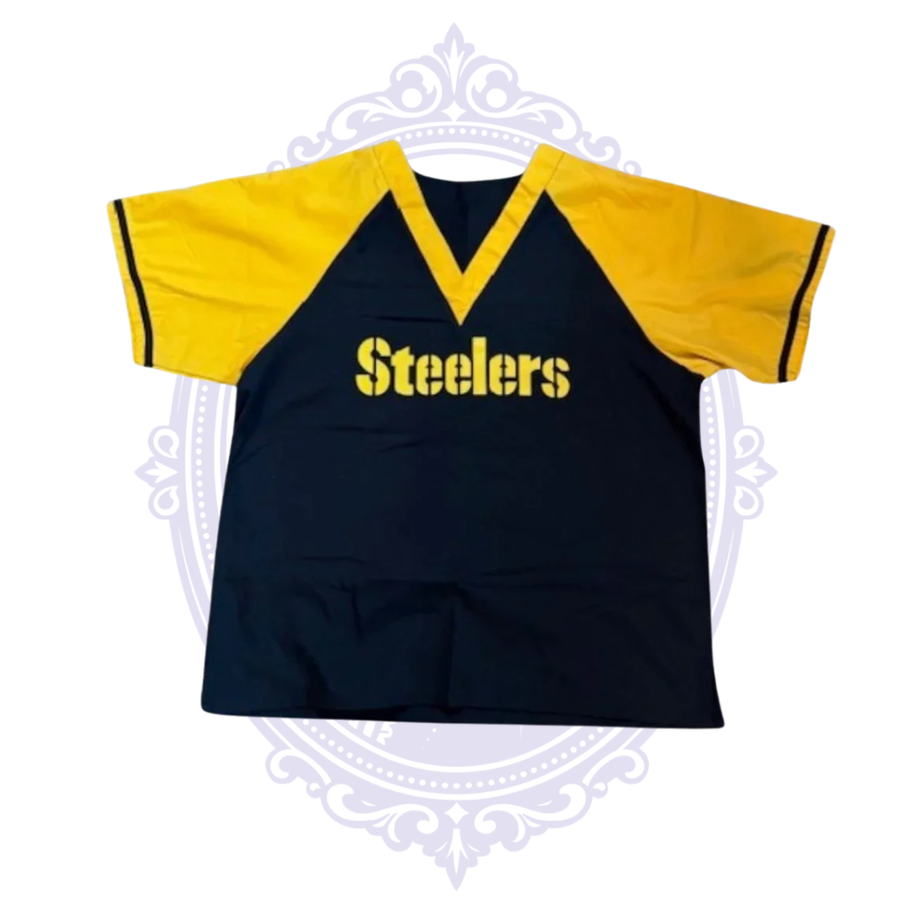 Front view of Pittsburgh Steelers women’s scrub top with black body, gold short sleeves, gold V-neck and Steelers chest logo.
