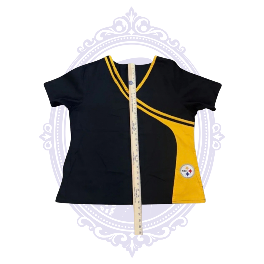 Pittsburgh Steelers women’s scrub top laid flat with ruler showing garment length from neckline to hem.