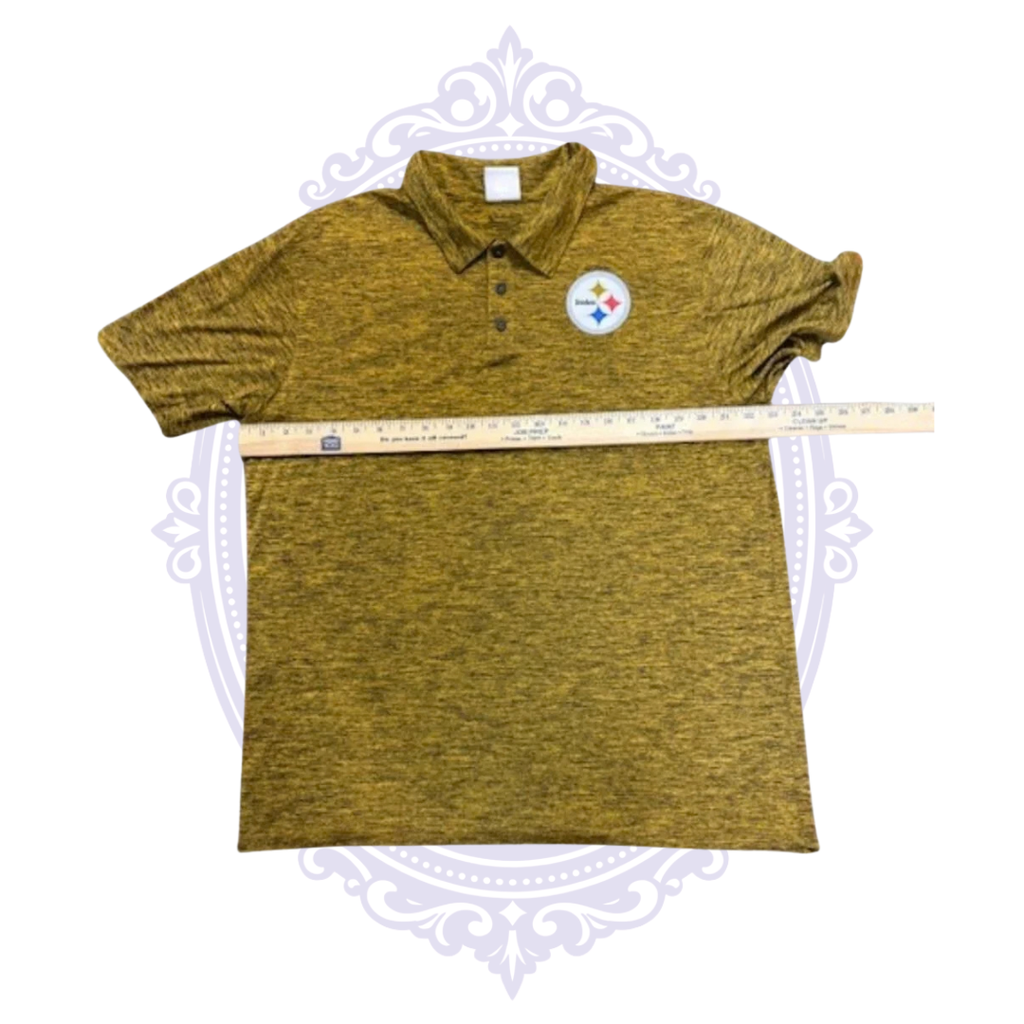 Pittsburgh Steelers men's gold performance polo shown with ruler across chest for width measurement.