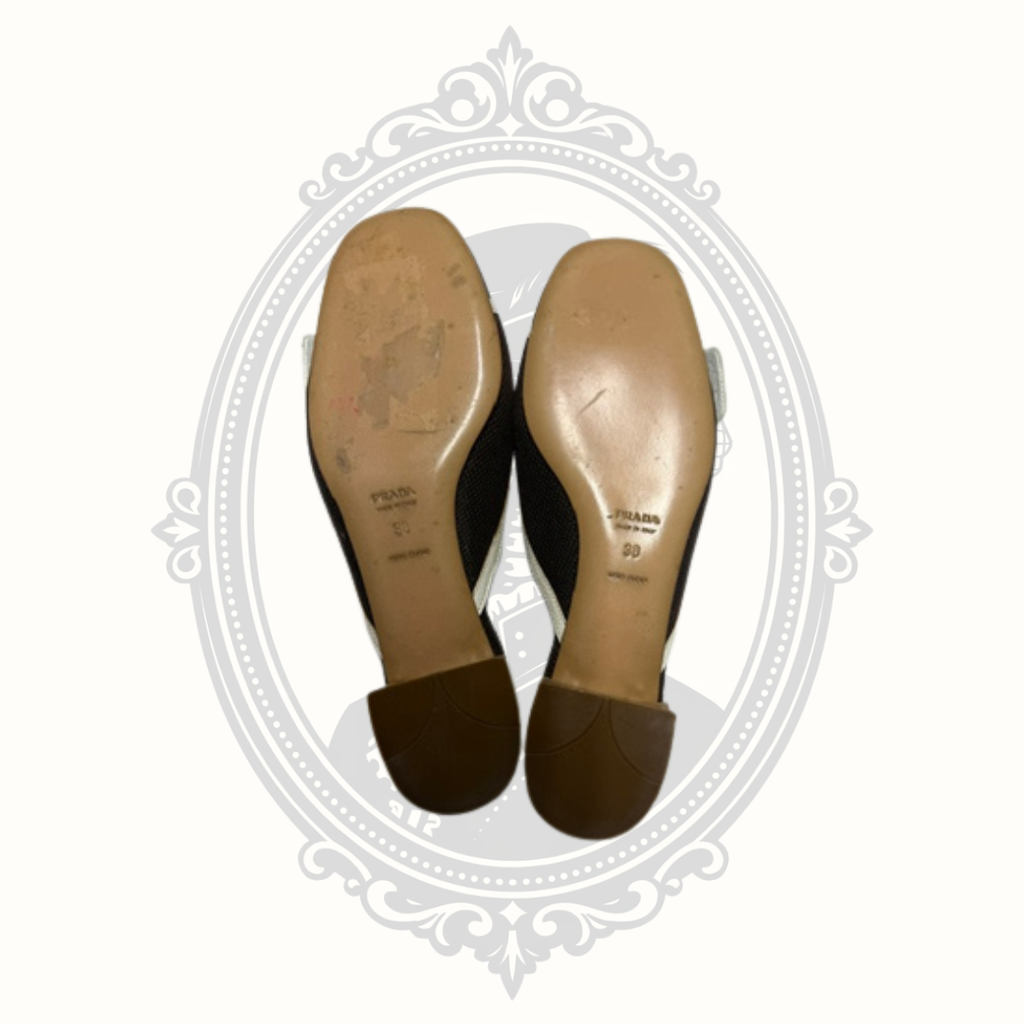 Prada mule shoes leather soles showing pre-owned wear