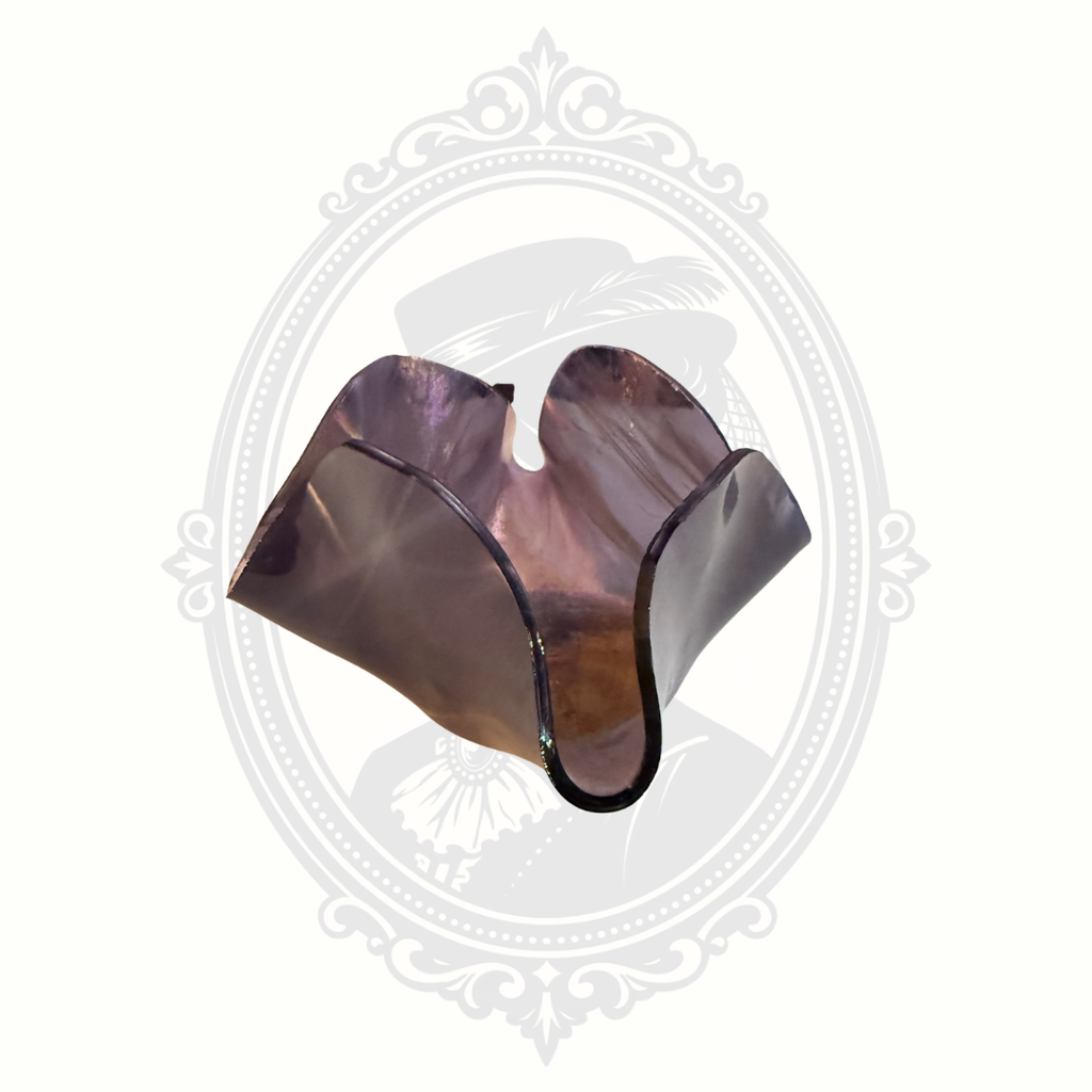 Purple iridescent glass catchall bowl with reflective finish and vintage-inspired decorative style.