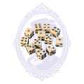 Twelve genuine water buffalo bone six-sided dice showing natural color and marking variations.