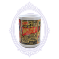 15 oz ceramic mug featuring a colorful retro Weird Show sideshow poster with skull and vintage carnival artwork.