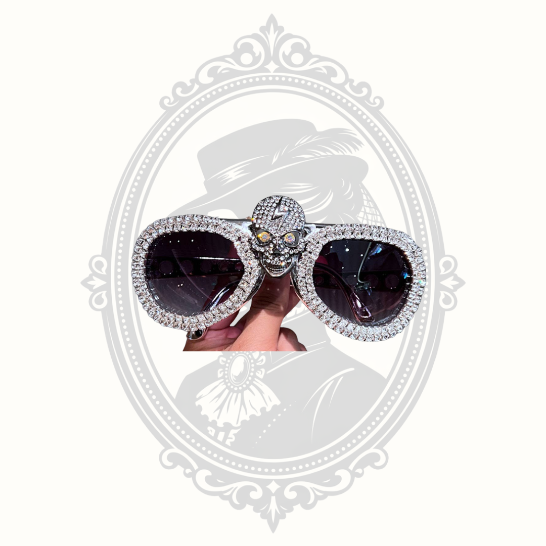 Front view of oversized rhinestone skull sunglasses