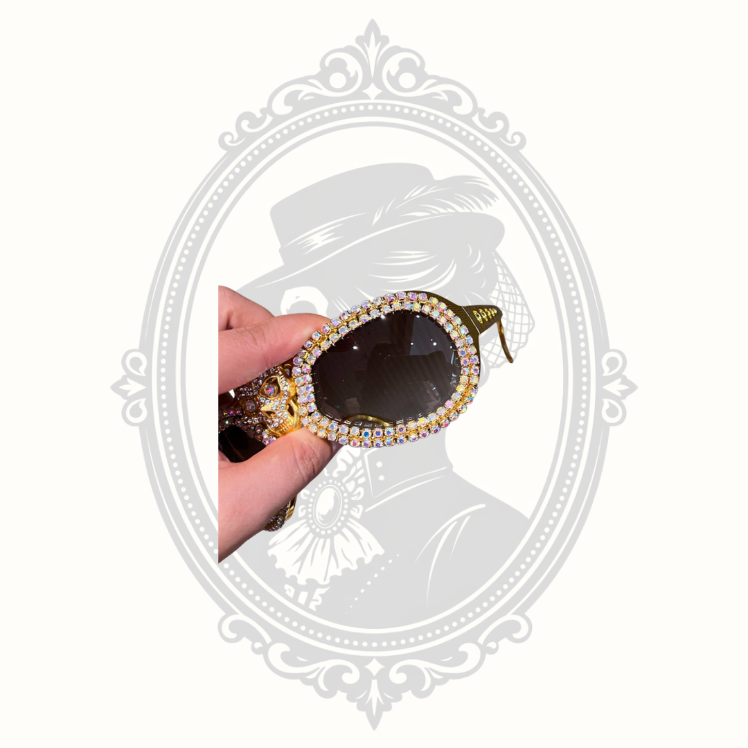 Side detail of rhinestone-encrusted cat eye sunglasses