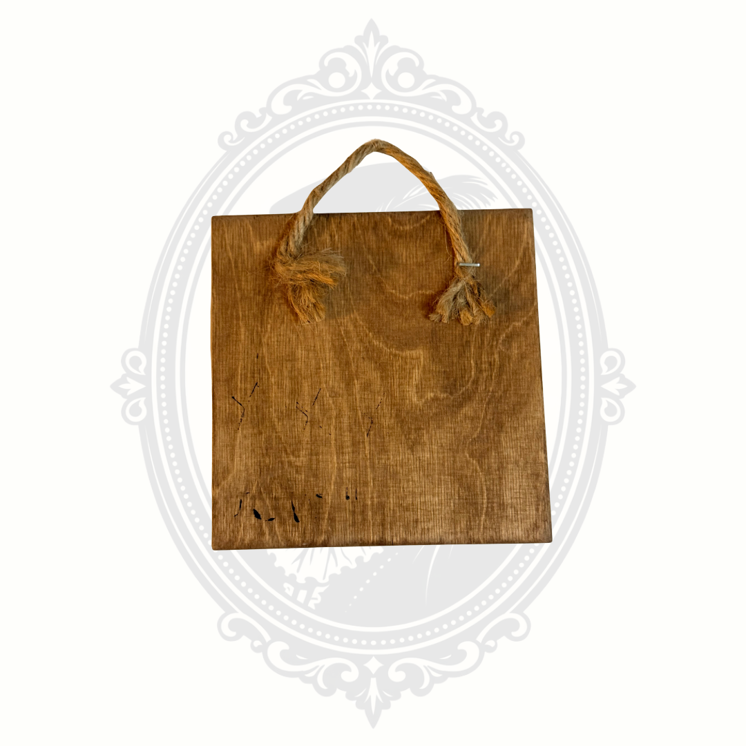 Back of rustic wooden novelty wall sign showing natural wood grain and attached rope hanger