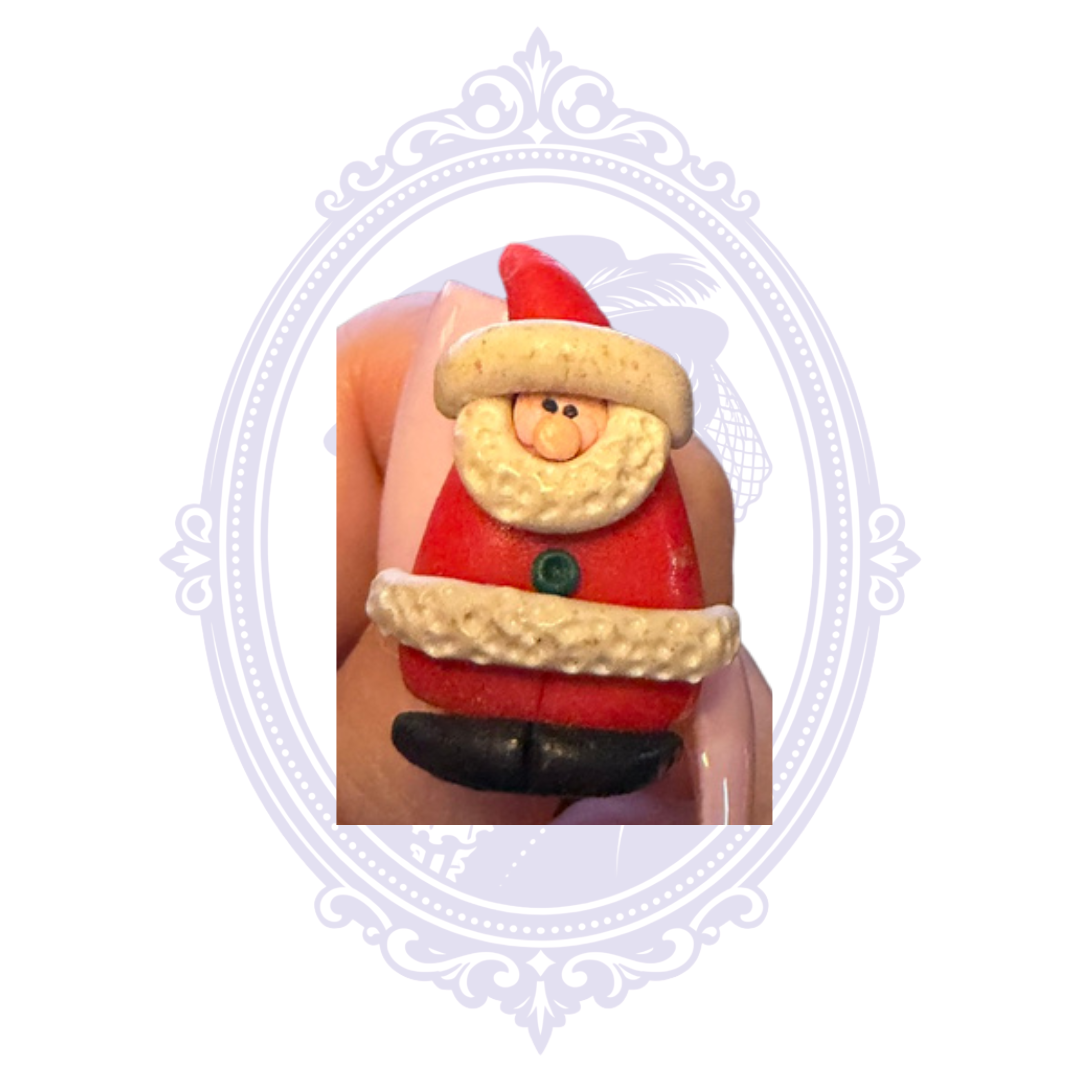 Small Santa Claus Christmas brooch shown in hand for size, red and white dimensional holiday jewelry pin.