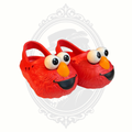 Pair of bright red Sesame Street Elmo kids clogs with oversized eyes and orange nose detail.