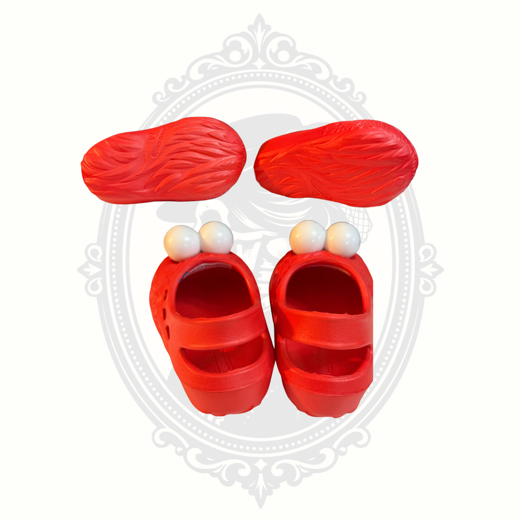 Bottom tread and rear strap view of red Sesame Street Elmo kids clogs.