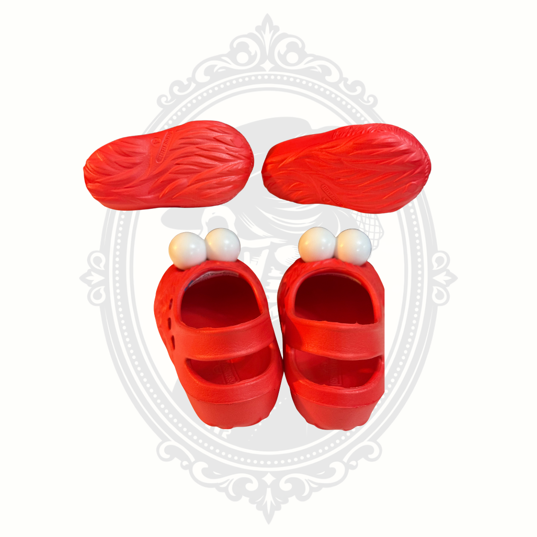 Bottom tread and rear strap view of red Sesame Street Elmo kids clogs.