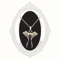 Close-up of a silver-tone Luna moth pendant necklace with detailed wing design.