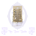 Six-pair set of gold-tone graduated geometric hoop earrings on original display card