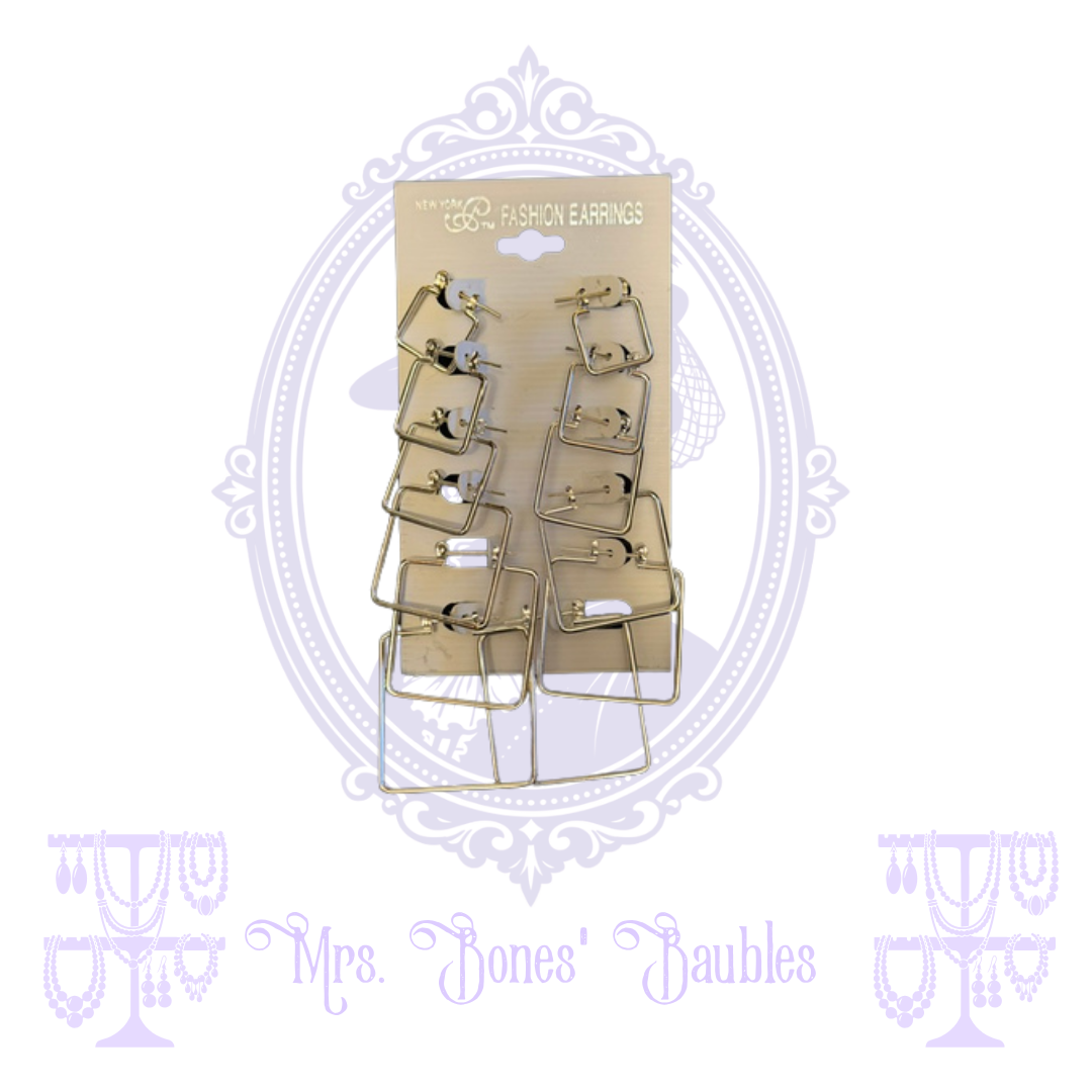 Six-pair set of gold-tone graduated geometric hoop earrings on original display card