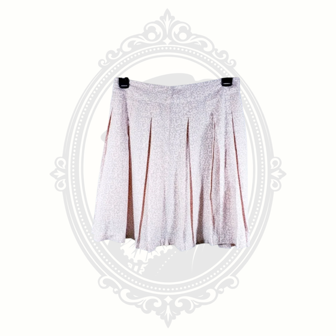 full view of pink leopard print pleated mini skirt lightweight lined design