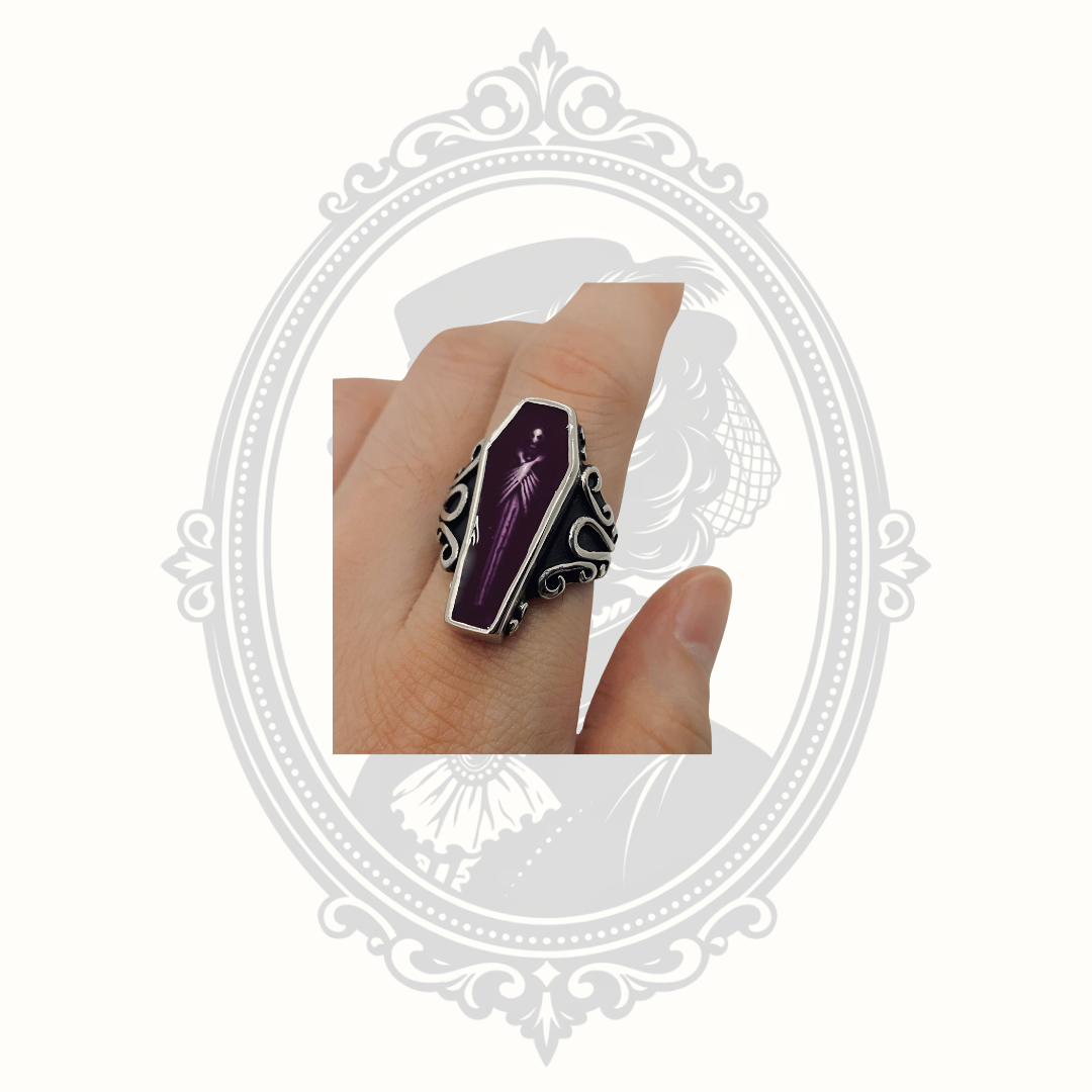 Skull Series Zombie Coffin stainless steel ring worn on a finger.