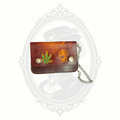 Small leather biker wallet with chain featuring tooled western design and snap closure