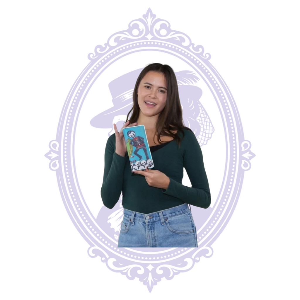 Model holding the sugar skull wallet vertically to show the skeleton man in black clothing on a turquoise background.