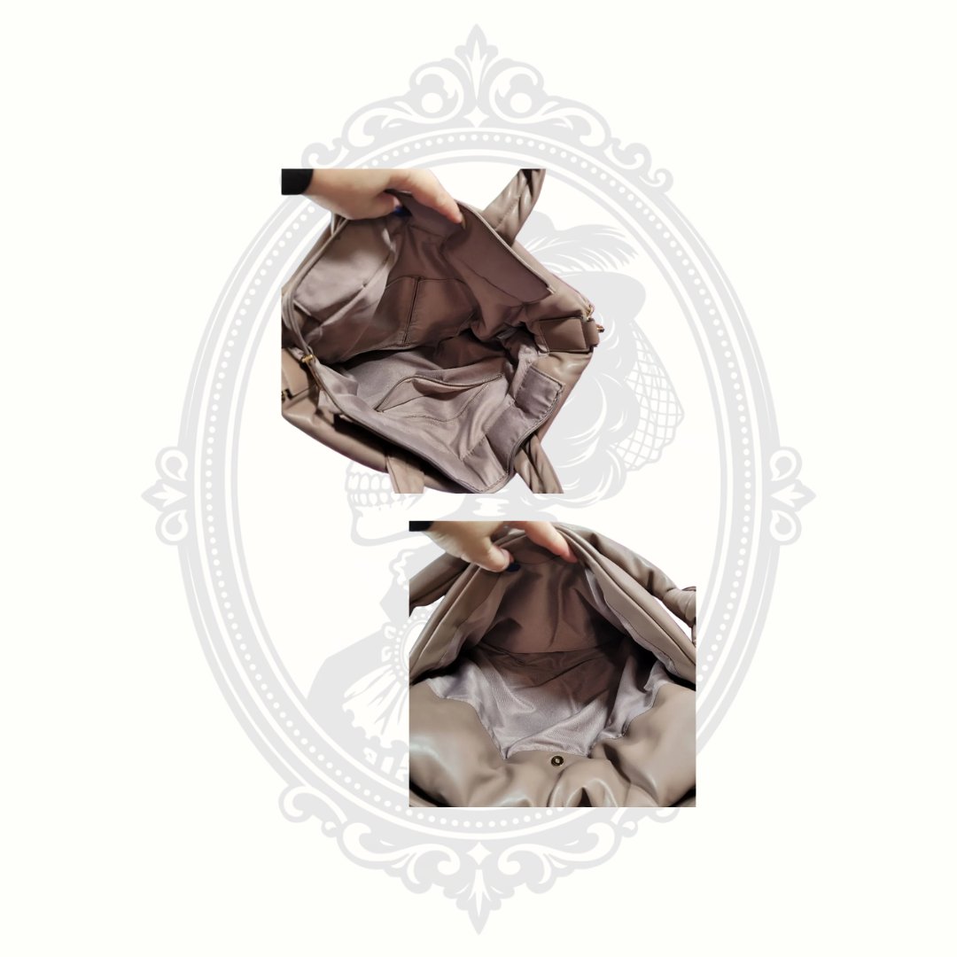 inside taupe tote bag showing zip pocket and interior compartments