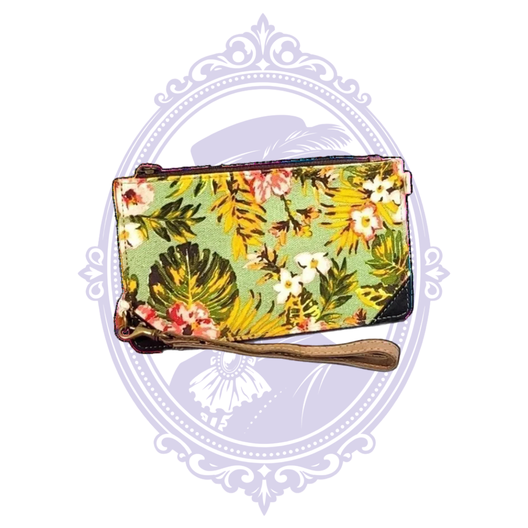 Vaan & Co. tropical floral canvas wristlet with green background, yellow leaves, pink flowers and leather wrist strap