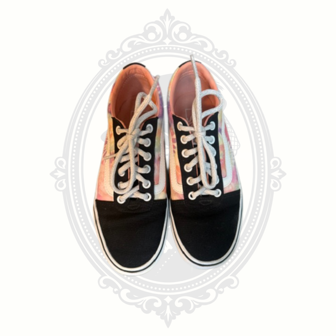 Top-down view of pastel tie dye VANS sneakers with white laces and black canvas toes.